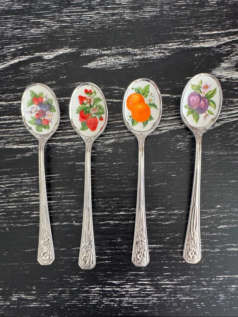 Vintage Avon stainless steel fruit spoons. Set of 4